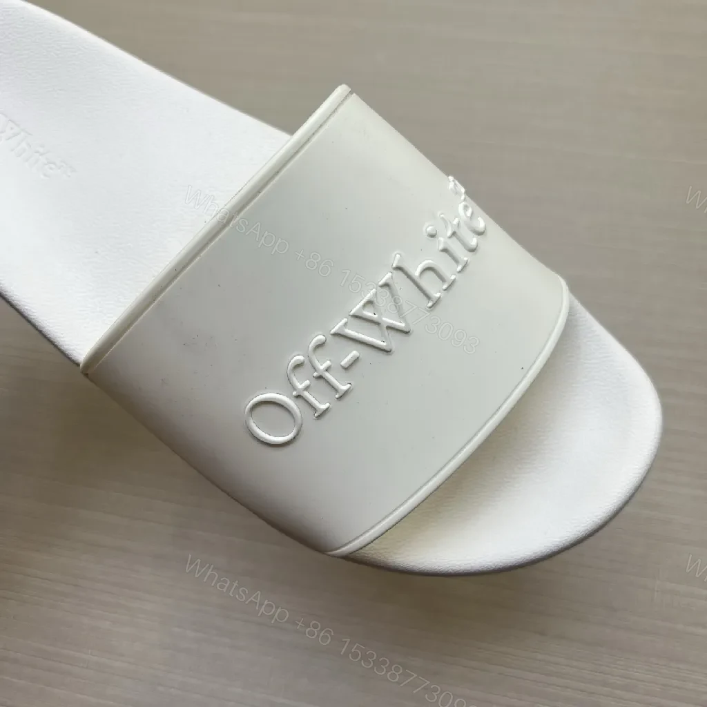 View 8 of White Leather-Feel Slides + Embossed Logo + Minimalist Luxury Sandals