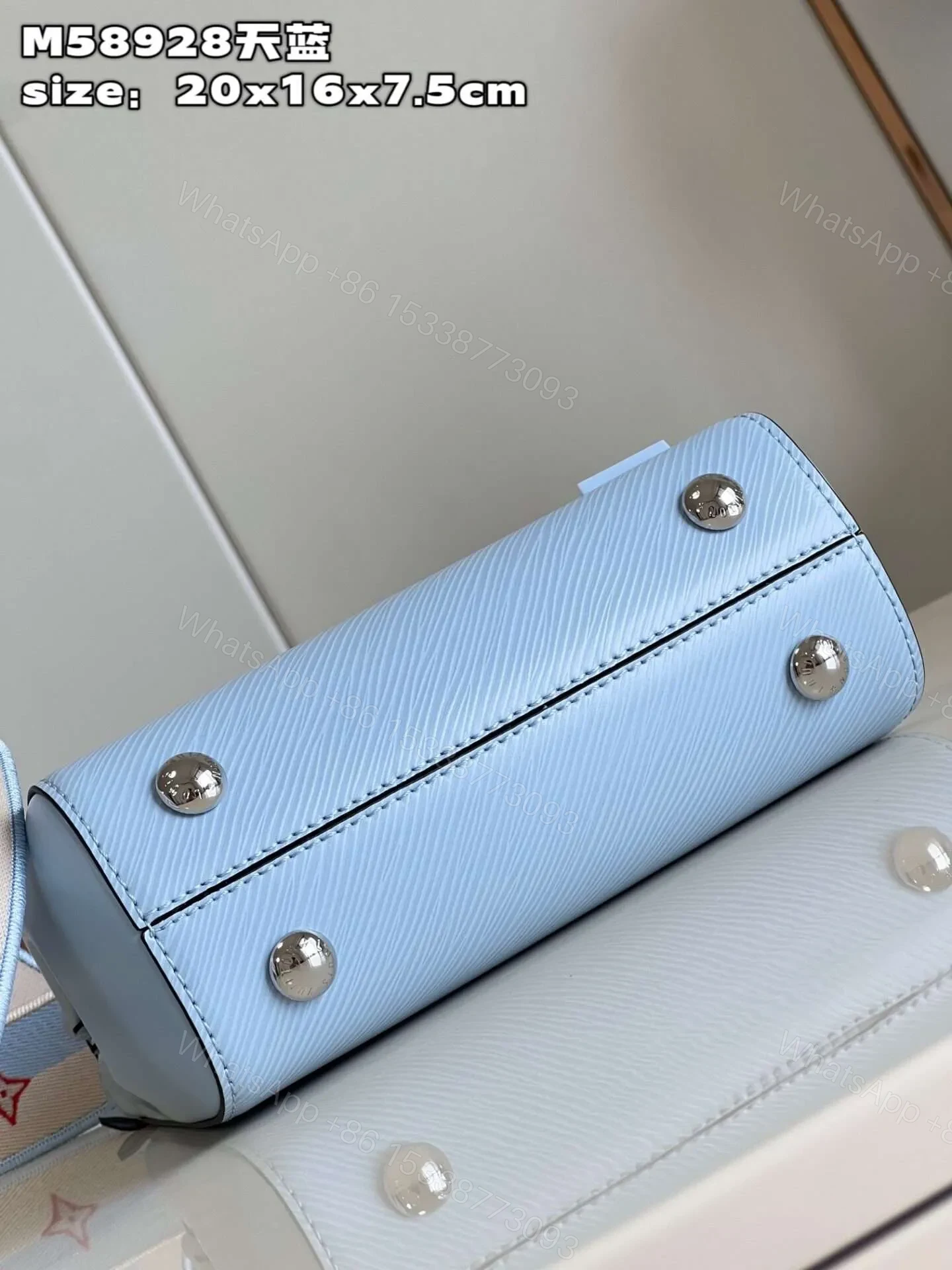 View 3 of Louis Vuitton Clunny Blue Raised Pattern Handbags 20x16cm