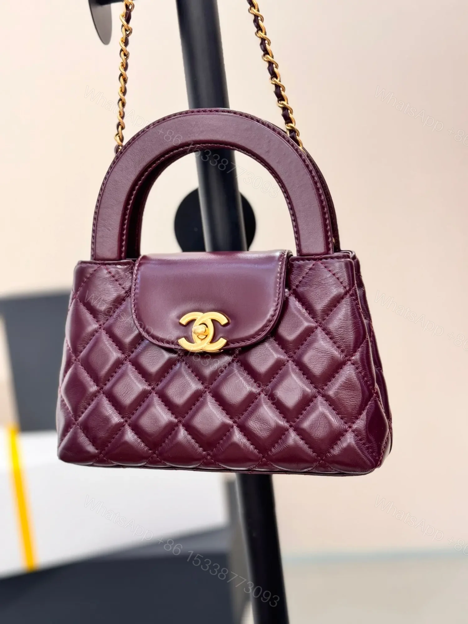 View 2 of CHANEL KELLY 19 IN WINE RED LAMBSKIN WITH GOLD HARDWARE