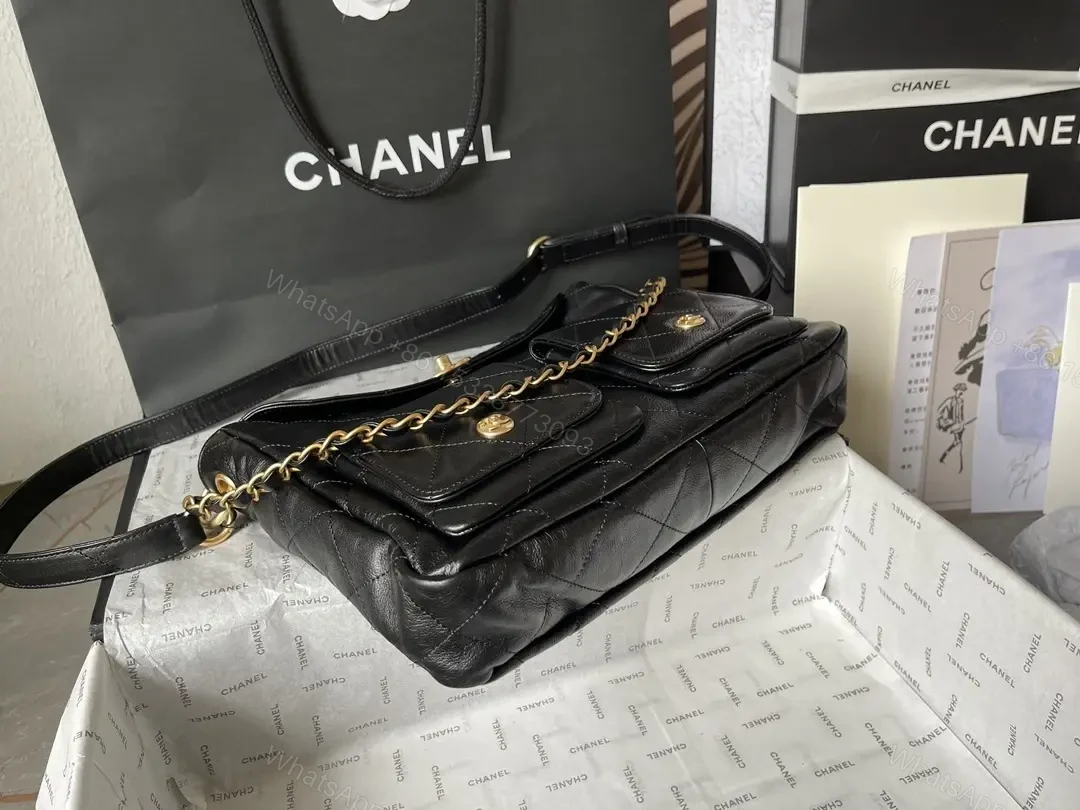 View 2 of Quilted Black Leather Satchel with Gold Chain Accent