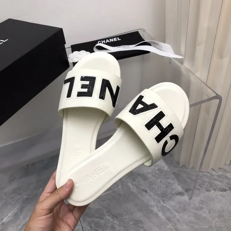 View 7 of Chanel-Inspired White Leather Slides with Bold Logo Strap