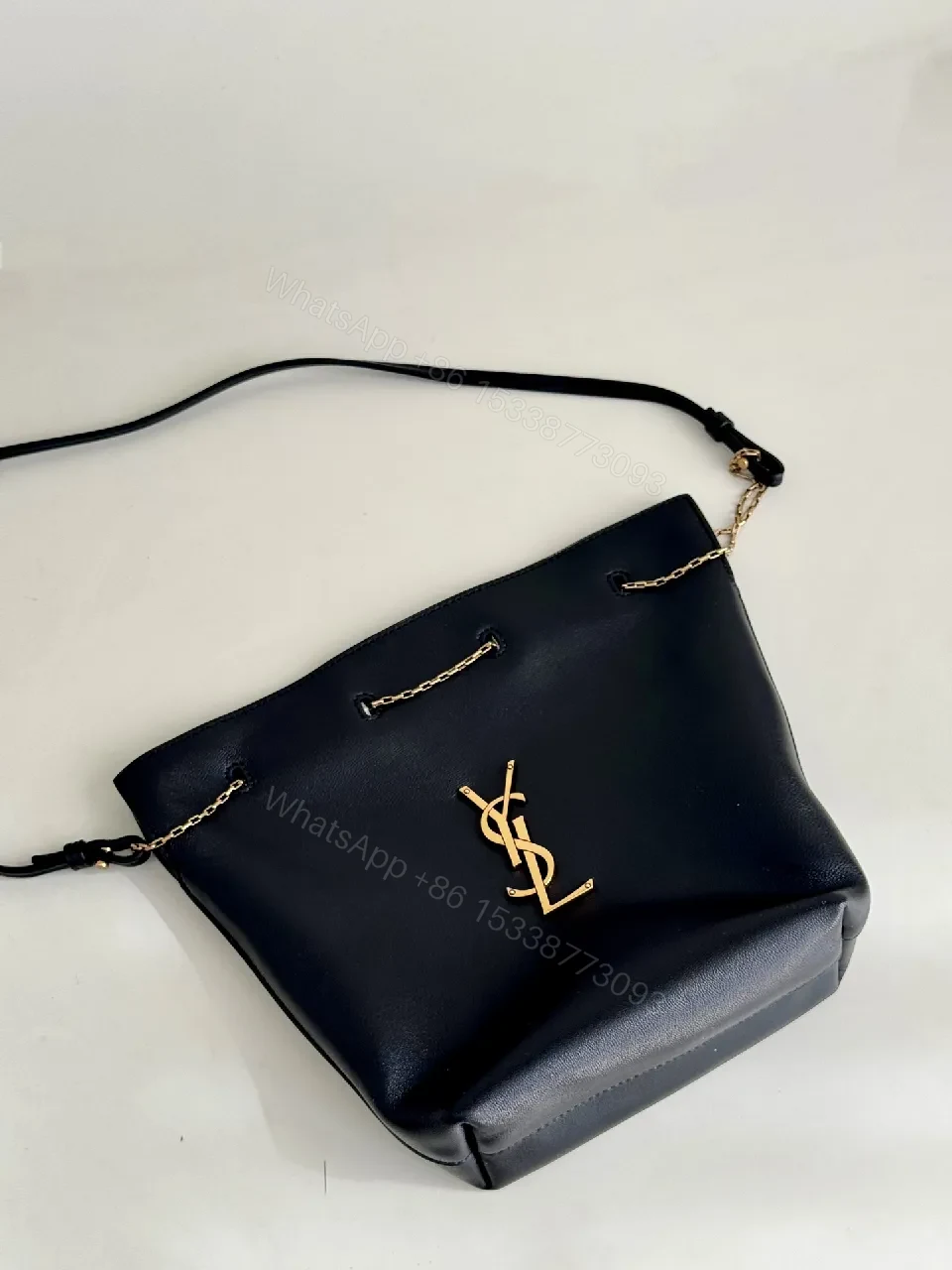 View 3 of Chic Black Leather Bucket Bag with Gold Logo