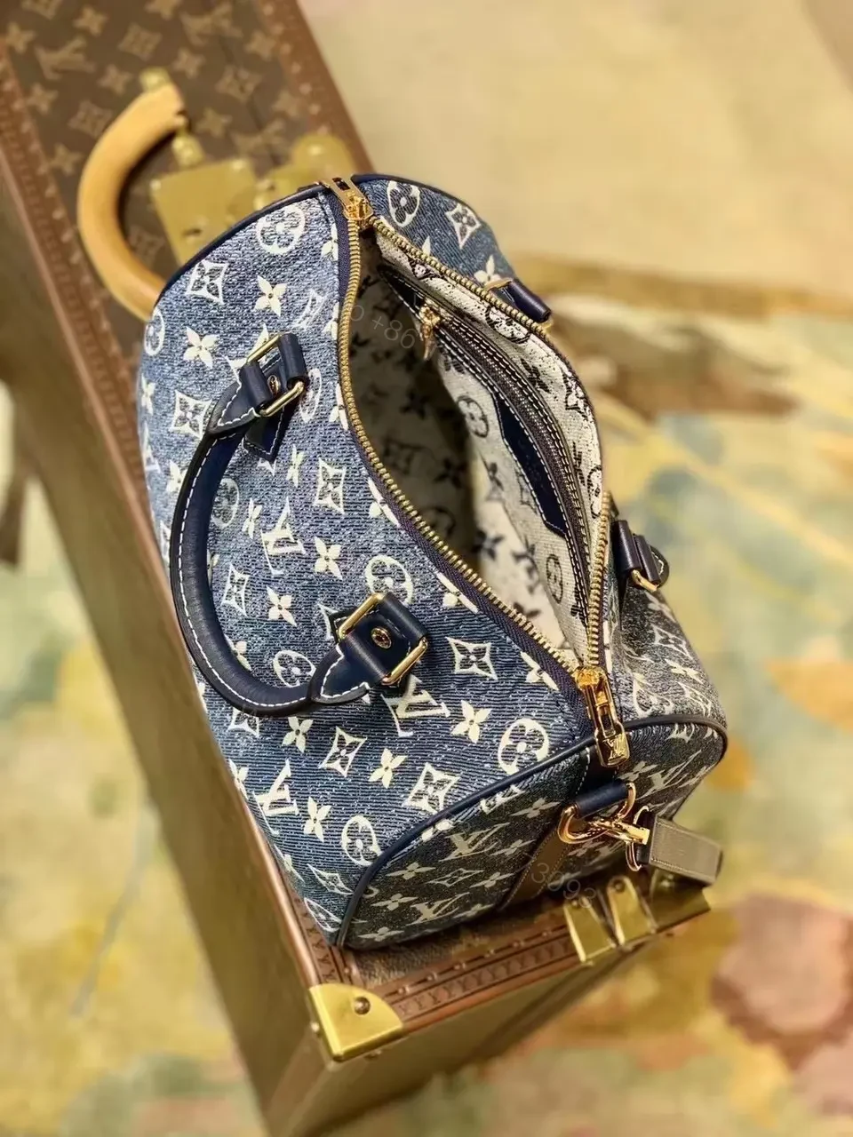 View 2 of Louis Vuitton Blue Monogram Denim Jacquard Speedy 25
