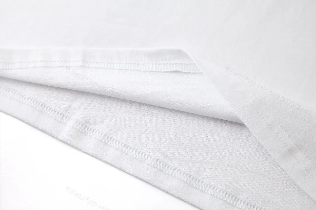 View 7 of White Cotton T-Shirt with Blue Loewe Logo Graphic