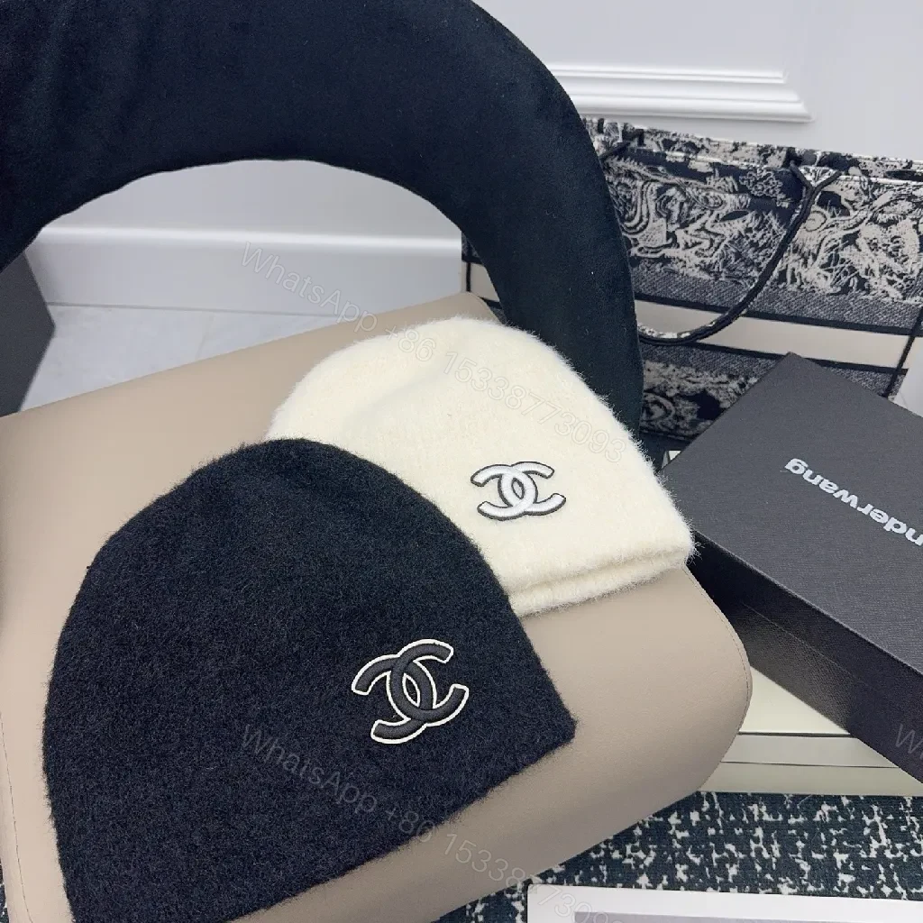 View 2 of Ivory Plush Handwarmer: Luxe Logo-Embossed, Lightweight Warmth