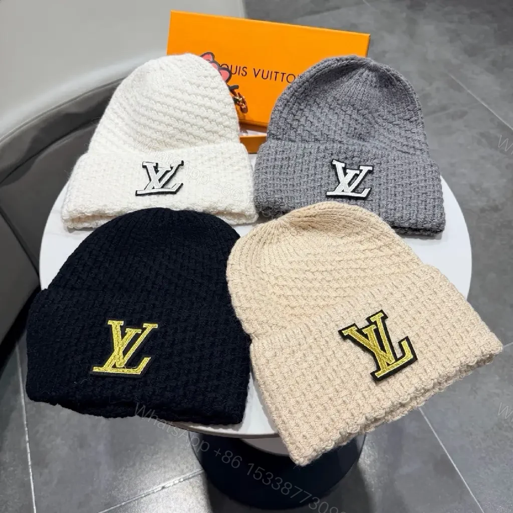 View 2 of Cozy Chic Beanie with Gold LV Emblem — Streetwise Luxury Beanie