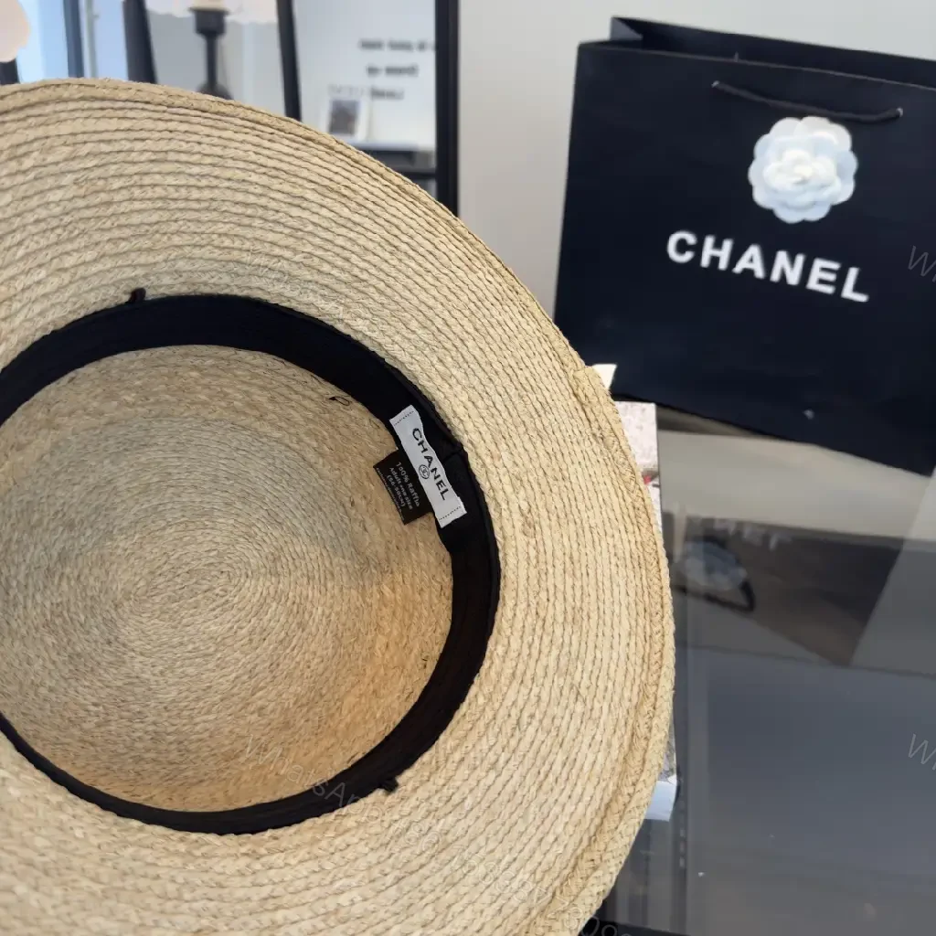 View 5 of Natural Straw Fedora Hat with Bow Ribbon Detail - Chanel Logo