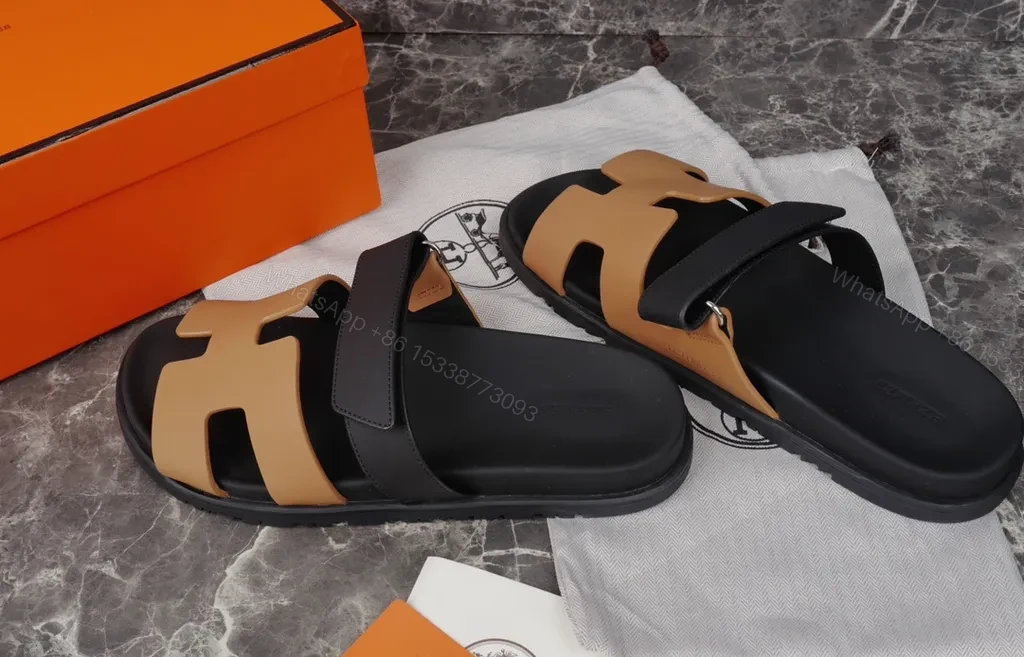 View 4 of Hermes Oran Leather Slides â€” H-Cutout, All-Day Comfort, Black/Tan