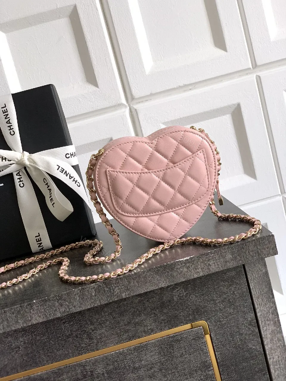 View 2 of Soft Pink Quilted Heart Mini Bag with Gold Logo Bag