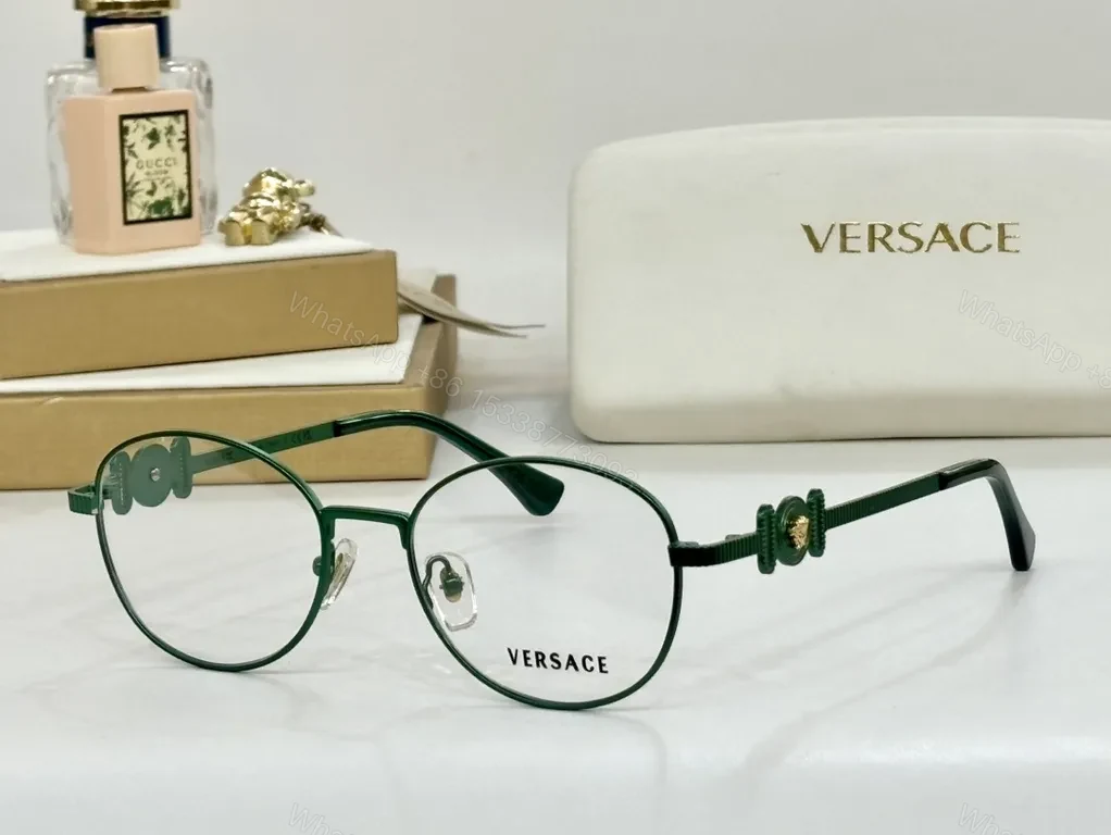 View 2 of Refined Round Eyewear: Luxury Metal Frames with Signature Detail