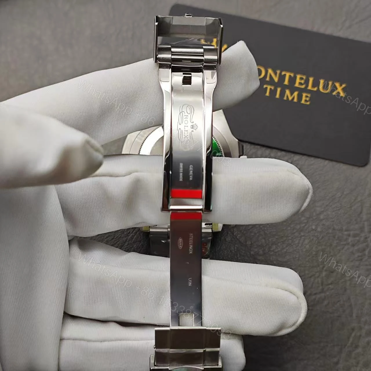 View 13 of Replica Rolex Submariner – Silver/Black 40mm 116610LN