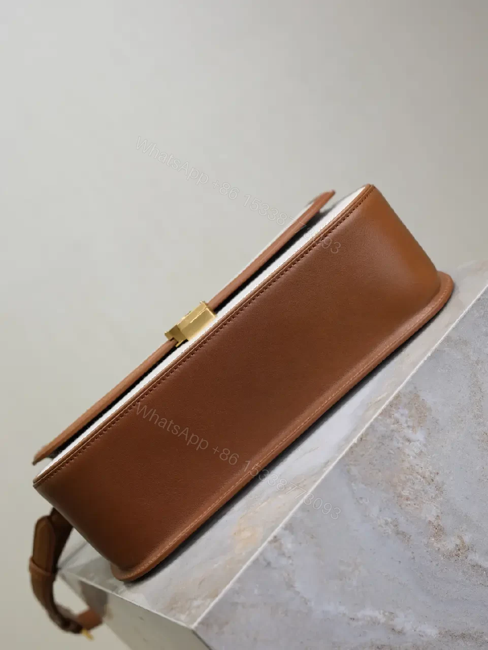 View 3 of Textured Crossbody Bag: Gold Hardware, Leather Trim, Chic Modern