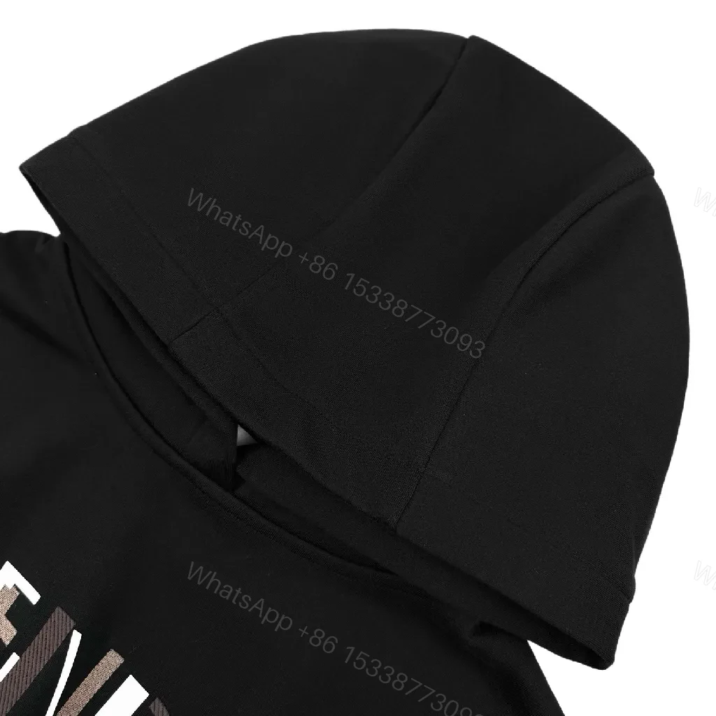 View 8 of Black Logo Hoodie: Subtle Luxe Graphic Comfort