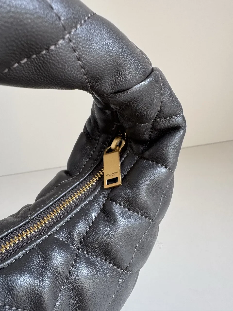 View 5 of Quilted Mini Bag with Gold Logo – Elegant Everyday Carry