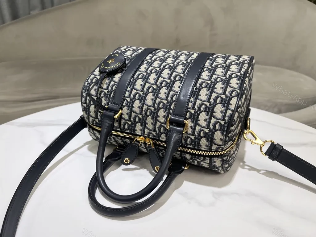 View 2 of Compact Luxury Satchel: Monogram Pattern, Gold Hardware, Crossbody/Top-Handle