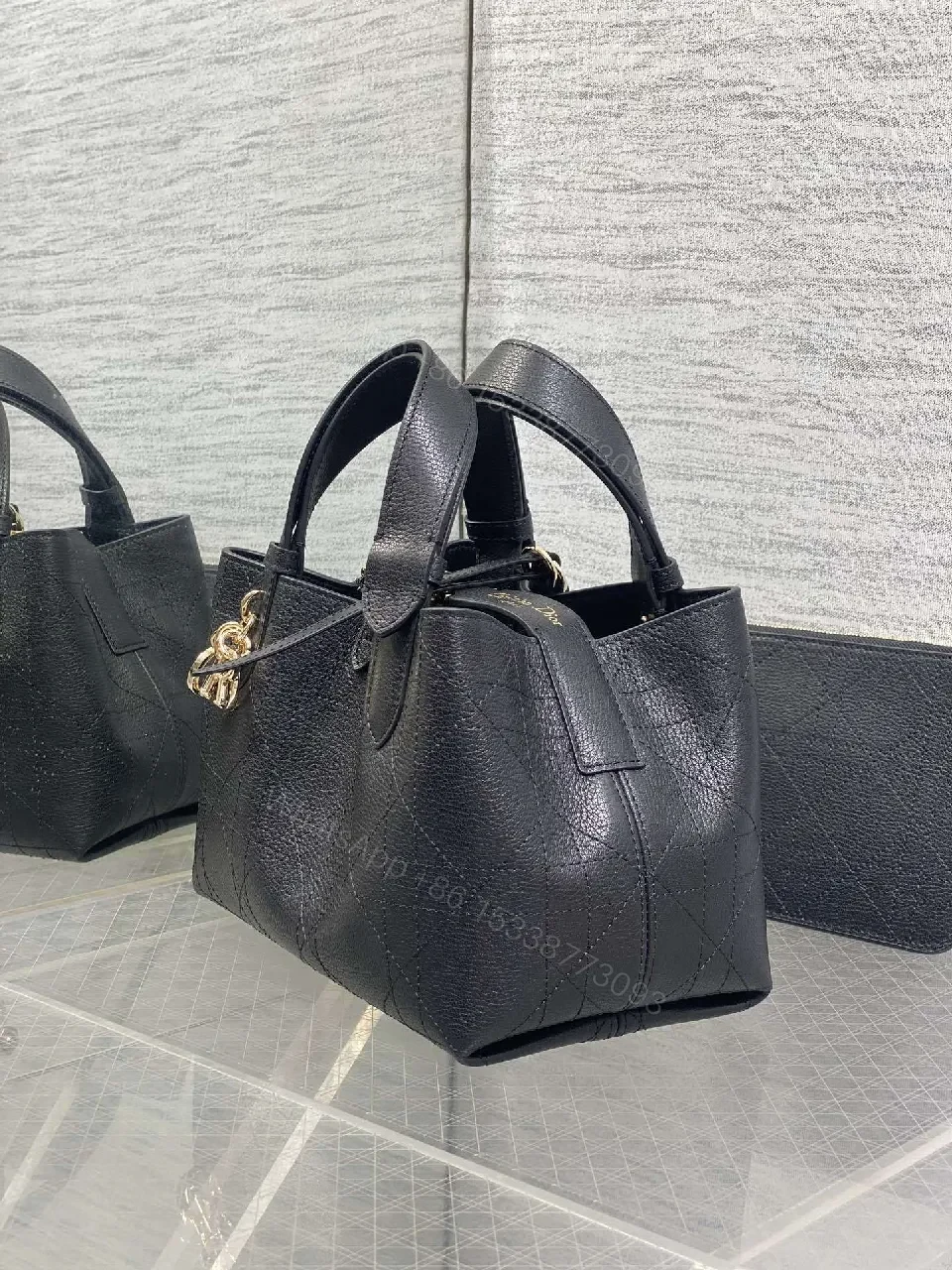 View 7 of Chic Quilted Mini Bag with Gold Charms - Versatile Luxury Bag