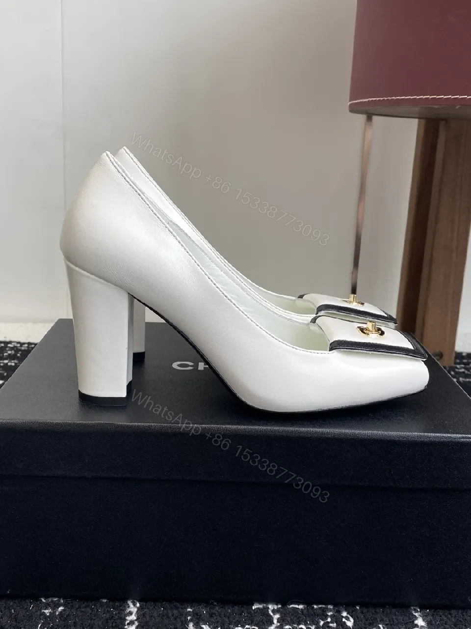 View 8 of White Leather Block-Heel Pumps with Gold Crest Accent