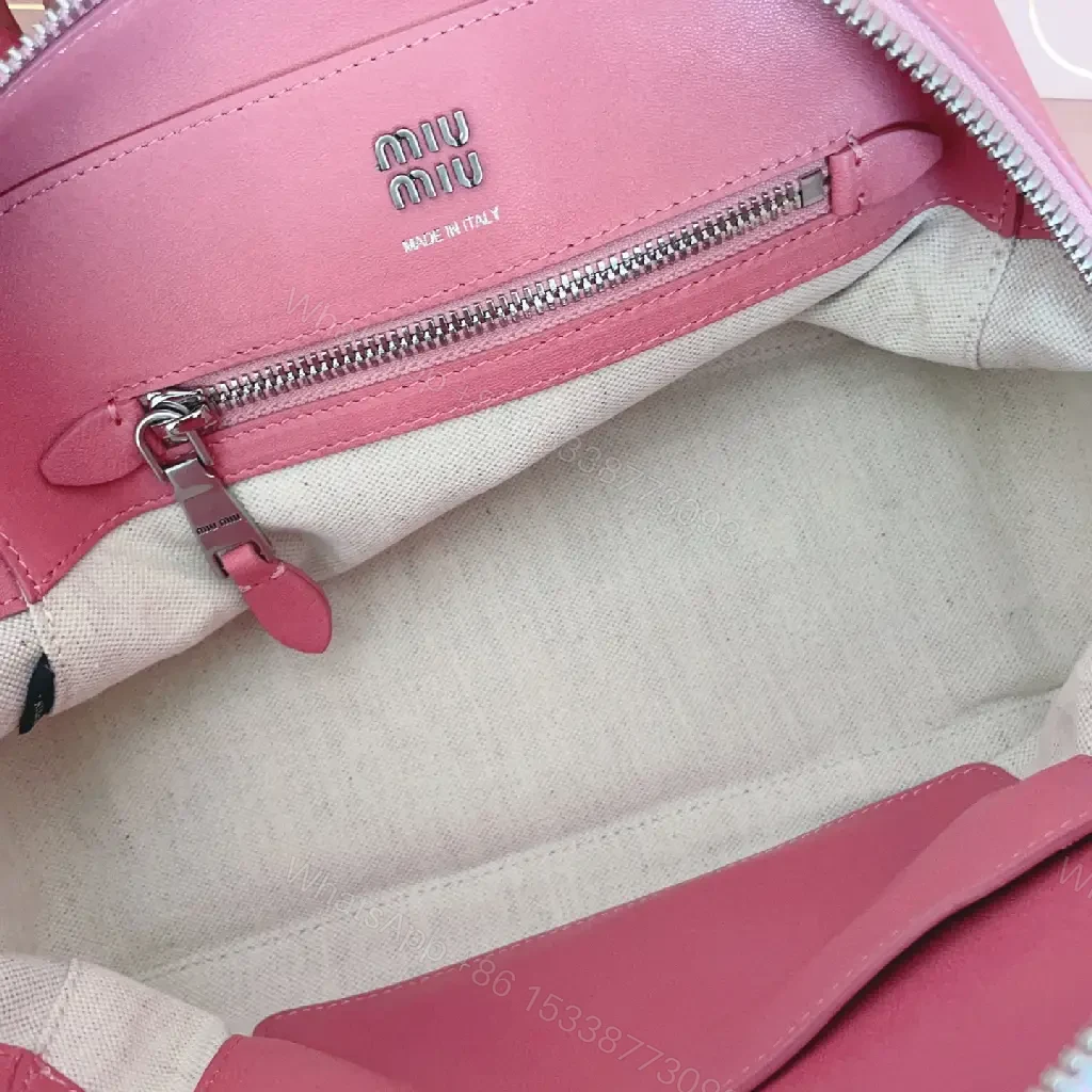 View 9 of Light Pink Leather Dome Satchel: Top-Handle Bag with Shoulder Strap
