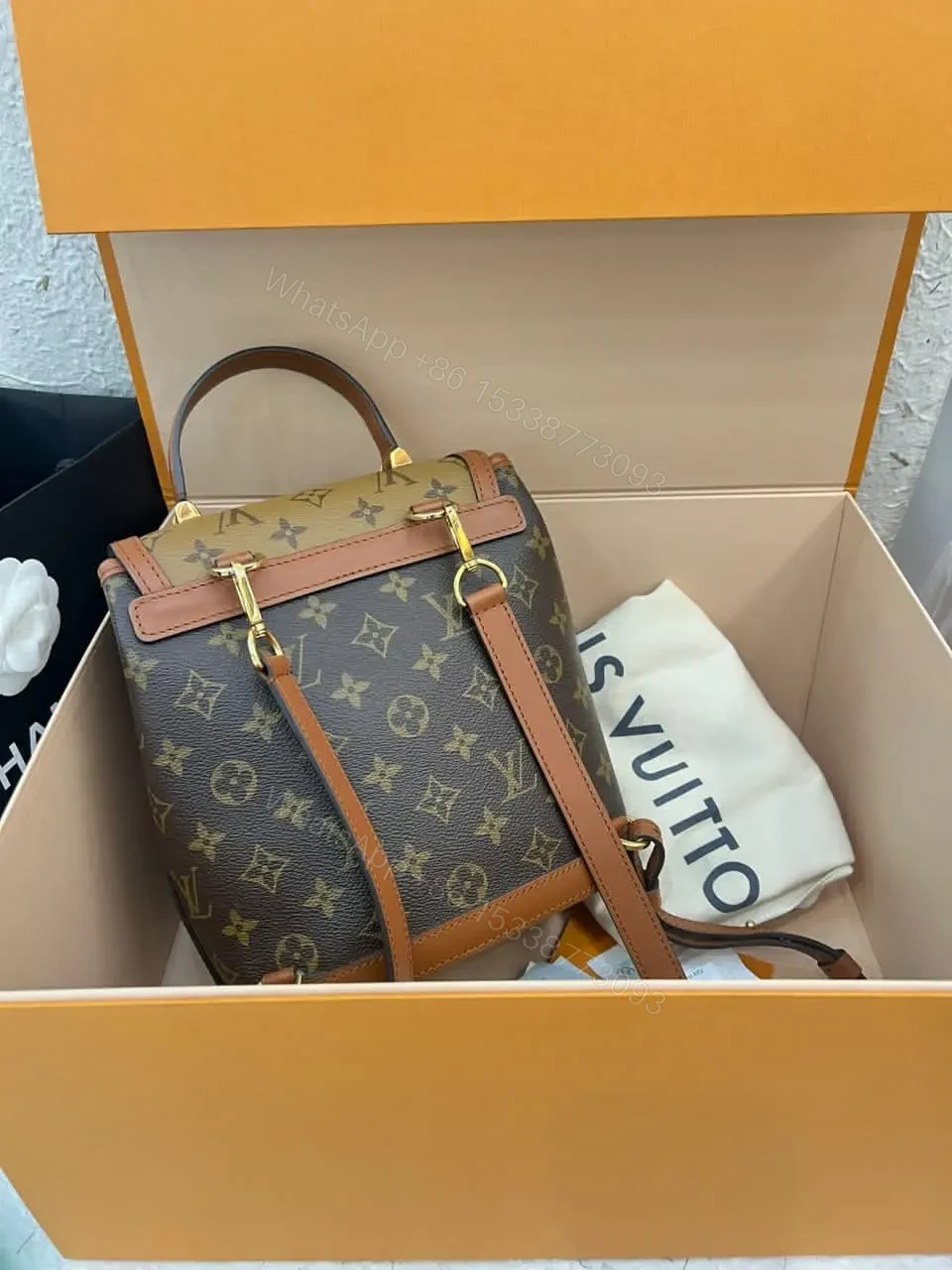 View 2 of Louis Vuitton Dauphine Monogram Reverse PM backpack