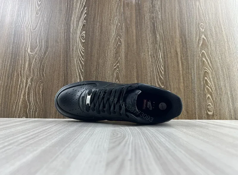 View 3 of Covert Black Leather Nike X Supreme Luxe Sneaker