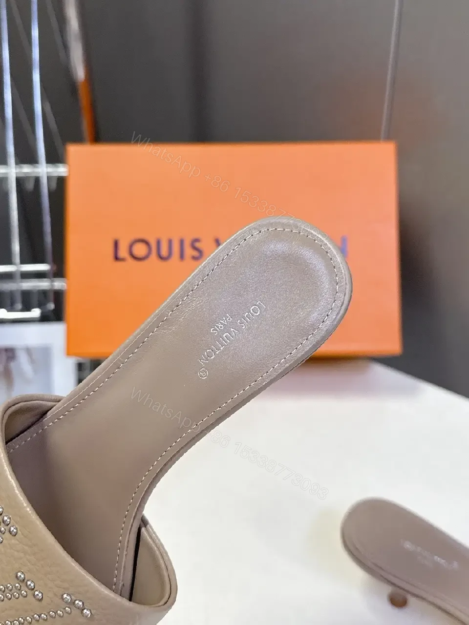 View 2 of Minimalist Taupe Leather Slides with Rhinestone Logo Embellishment