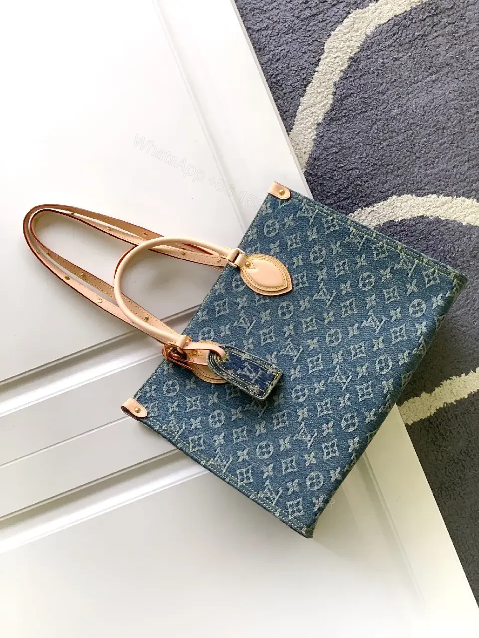 View 6 of Denim Monogram Tote: Premium Denim Leather-Trim Tote with Signature Details