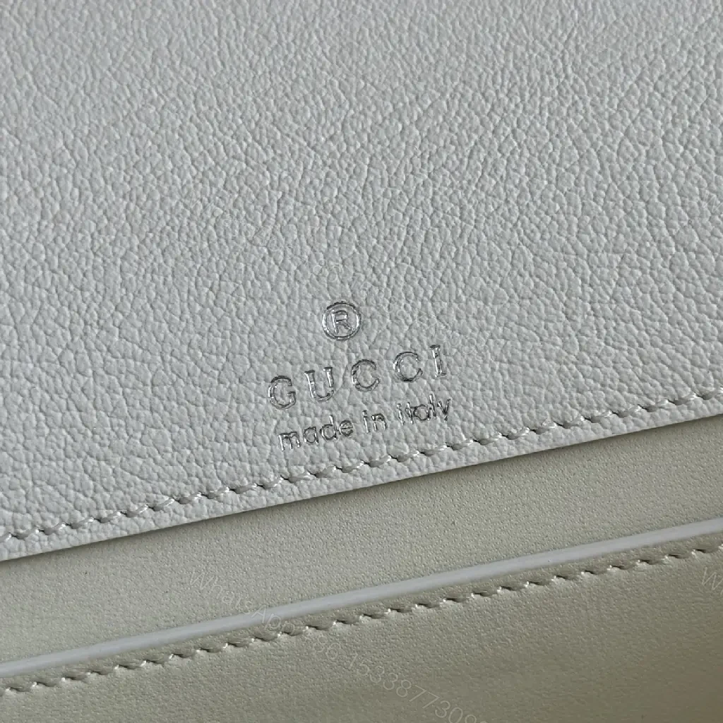 View 10 of Off-White Cream Pebbled Leather Structured Flap Bag with Gold Horseshoe Clasp