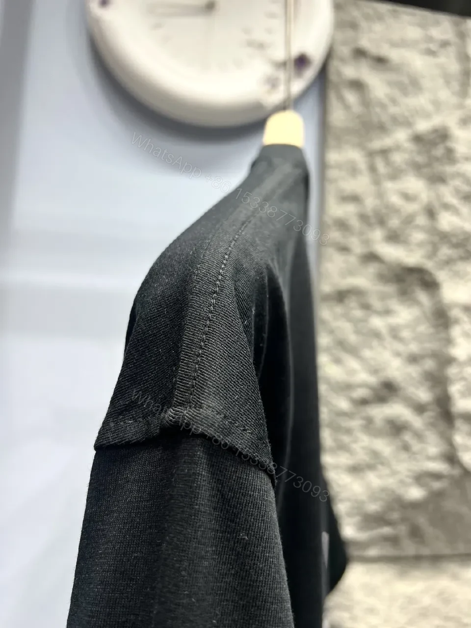 View 10 of Black Emblem Tee: Subtle Luxury Everyday Wear
