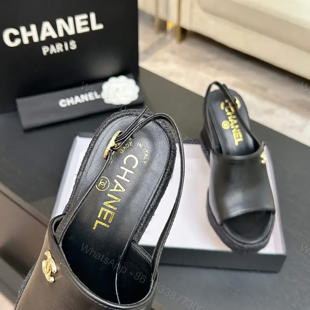 View 10 of Chic Black Leather Wedge Sandals - Gold Emblem, Open Toe, Slingback