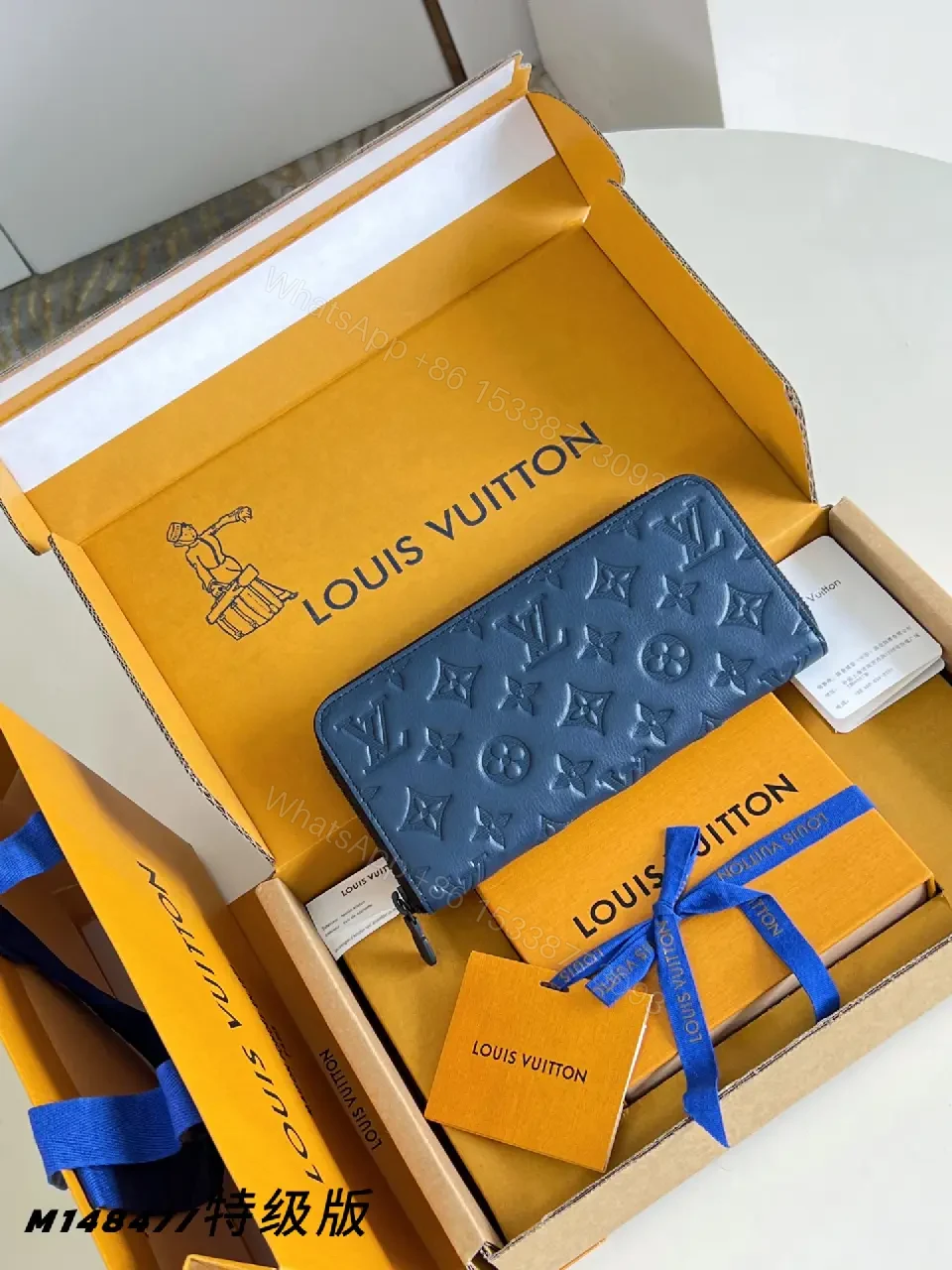 View 4 of Blue Embossed Leather Minimalist Zip Wallet with LV Pattern