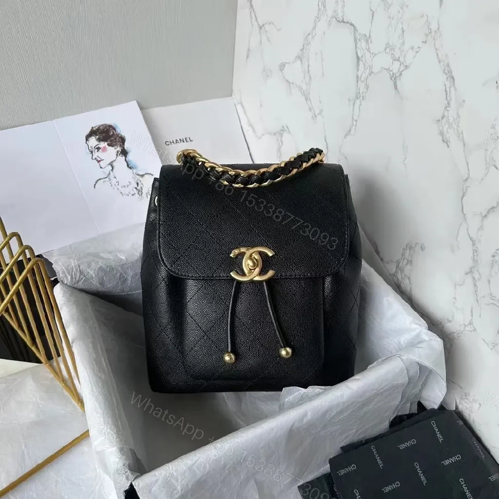 Black Faux Leather Mini Backpack with Gold Chain Interlock — view 1