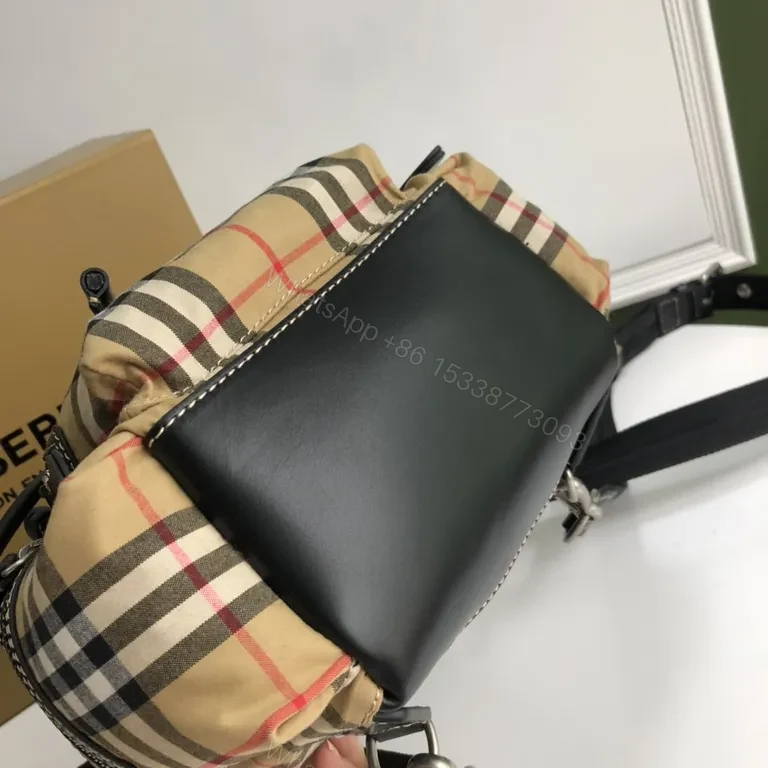 View 6 of Burberry-Inspired Plaid Compact Backpack with Leather Trim