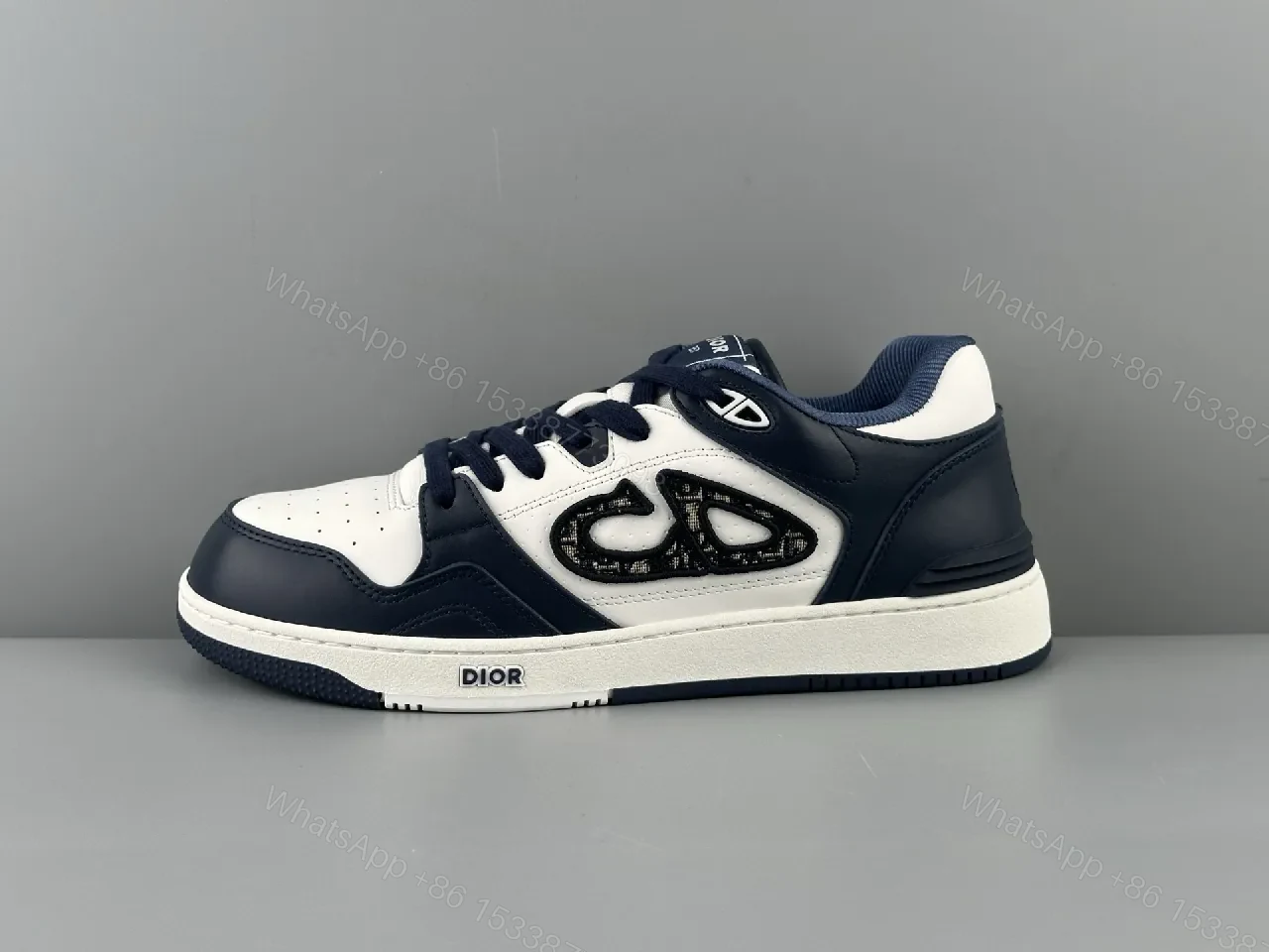 Navy Leather High-Top Sneaker with Cutout Detailing — view 1