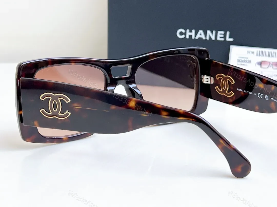 View 7 of Bold Tortoise Acetate Oversized Sunglasses with Gold Logo Details