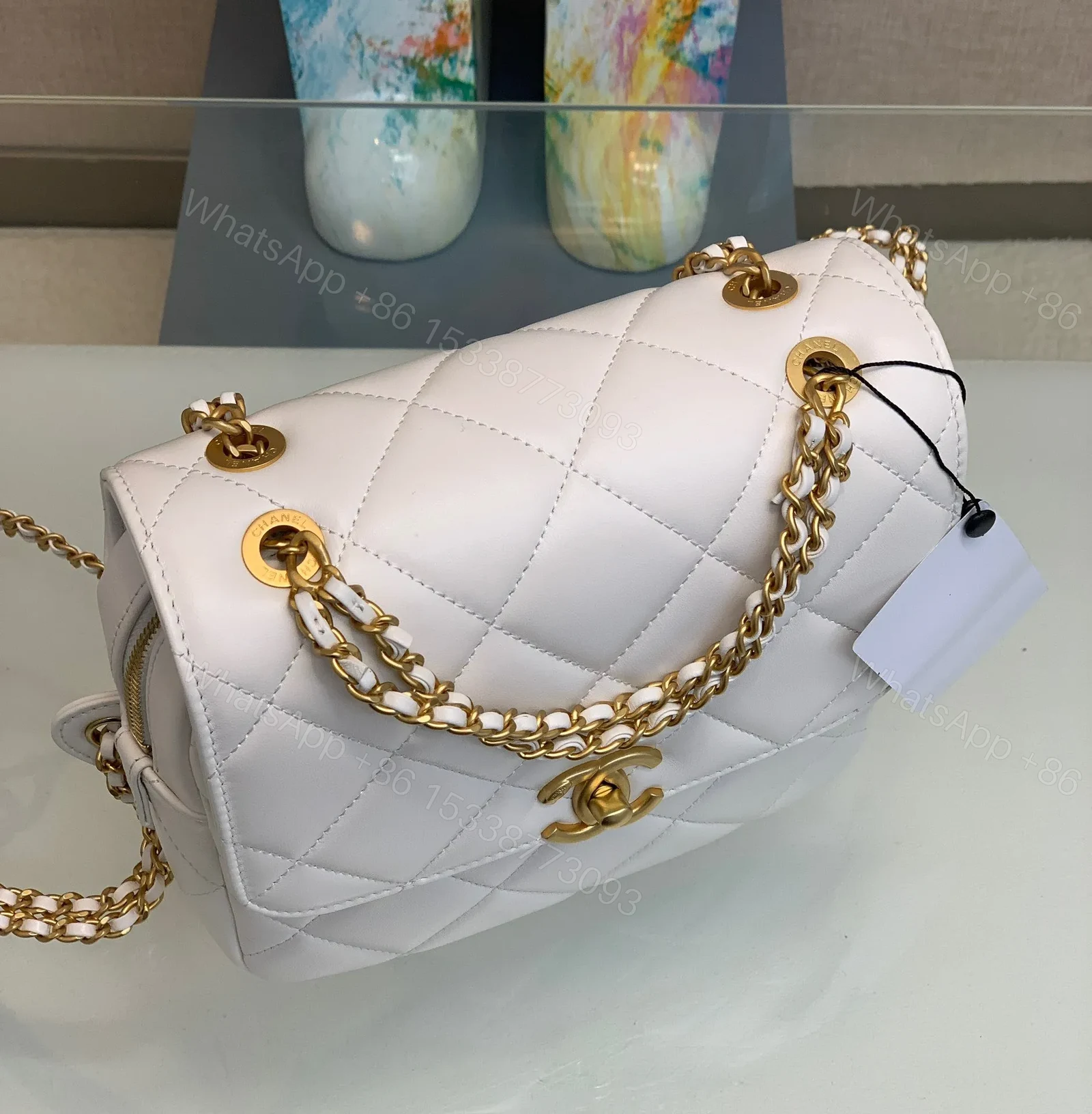 View 5 of Chanel Mini Backpack Replica 11 Milk White With Gold Lock 18x20x11.5cm
