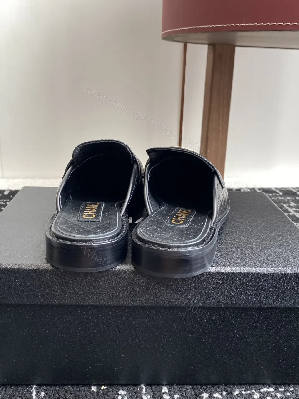 View 9 of Quilted Leather Mules with Gold Logo — Black, Premium Style