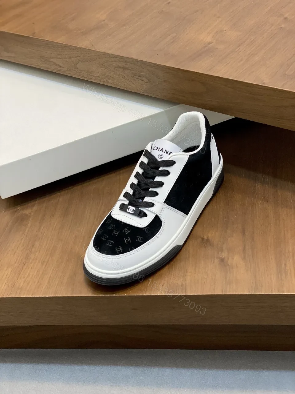 View 3 of Monochrome Leather Low-Top Sneakers: Luxury Comfort