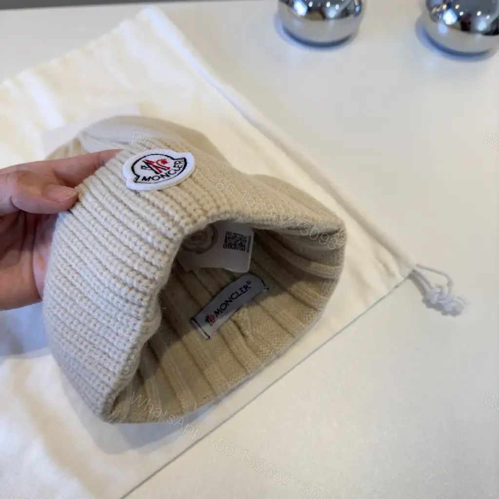 View 2 of Beige Ribbed Knit Beanie – Luxury, Signature Patch, Everyday Style