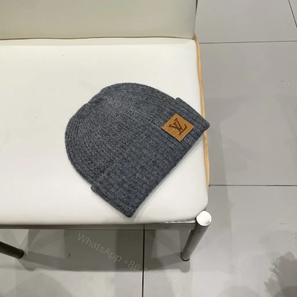 View 3 of Charcoal Knit Beanie with Leather Patch – Subtle Luxury Everyday