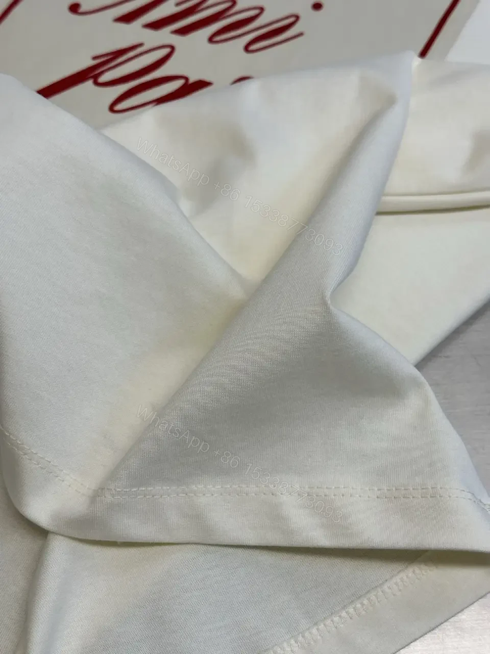 View 3 of Paris Flair Tee: Off-White Cotton Blend, Minimal Crest Graphic