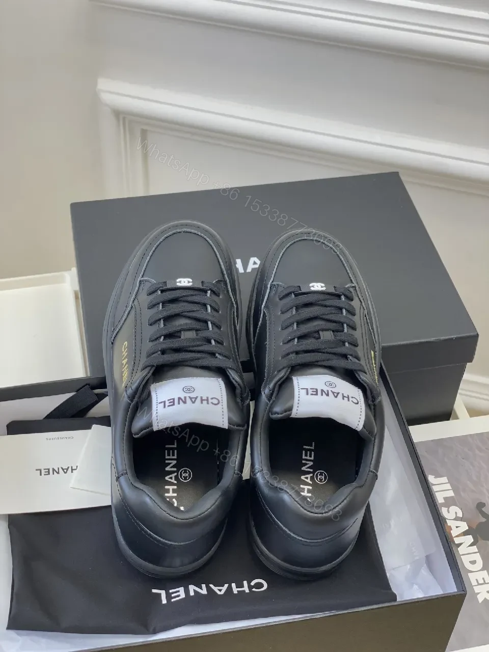 View 7 of Black Leather Sneakers, Subtle Gold Accents, High-Top Style, Everyday Luxury