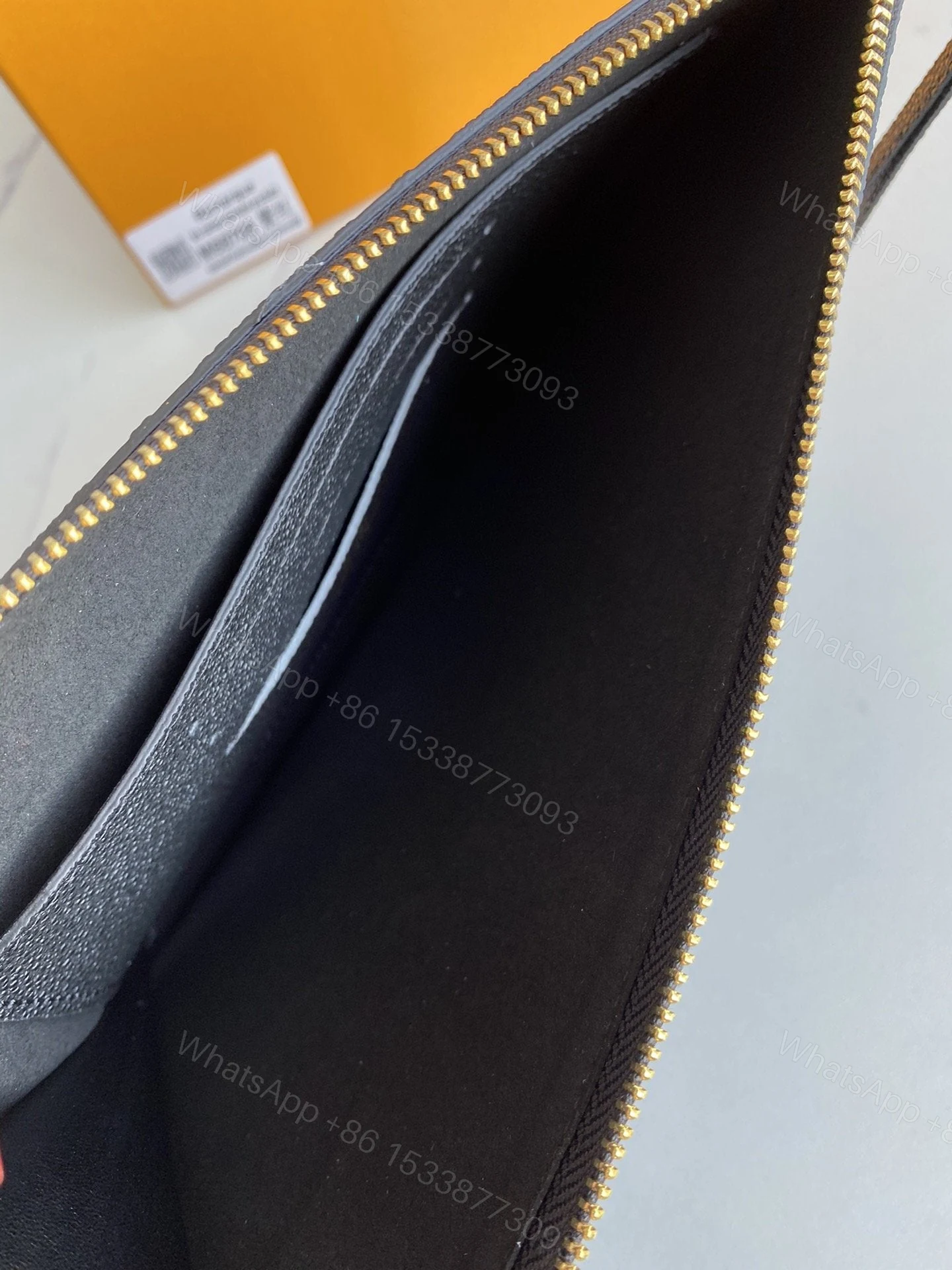 View 8 of Louis Vuitton Empreinte Daily Pouch Black