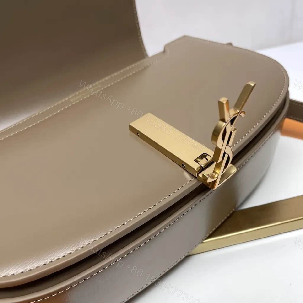 View 3 of Taupe Leather Saddle Bag with Subtle Designer Hardware