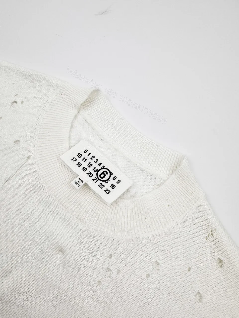 View 7 of Off-White Knit Crewneck Sweatshirt with Distressed Texture