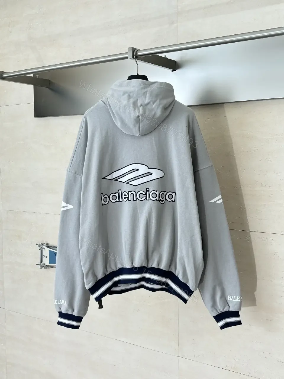 View 6 of Soft-Edge Comfort Hoodie: Graphic Branding, Oversized Streetwear