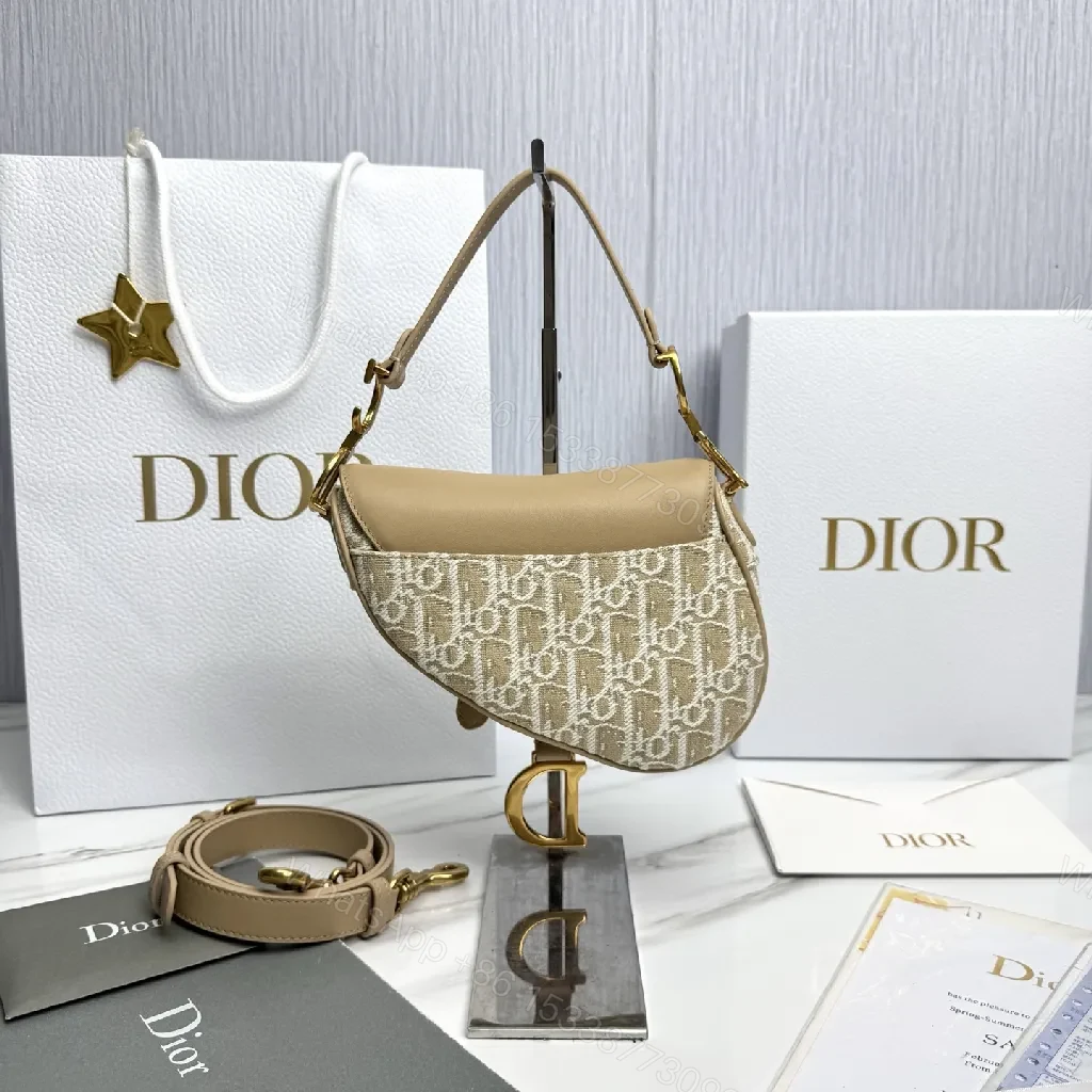 View 4 of Beige Leather-Trim Mini Saddle Bag, Monogram Canvas, Crossbody