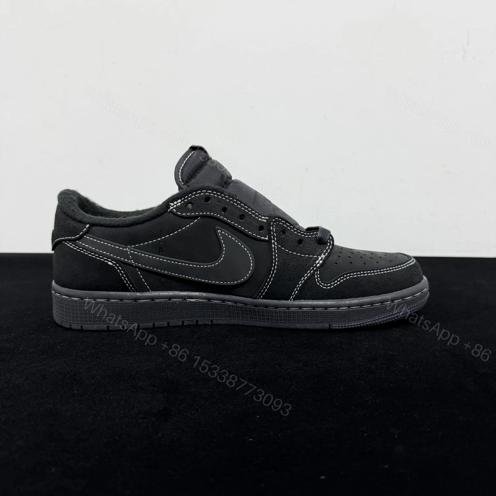 View 2 of Travis Scott x Air Jordan 1 Low “Black/Phantom” Reps