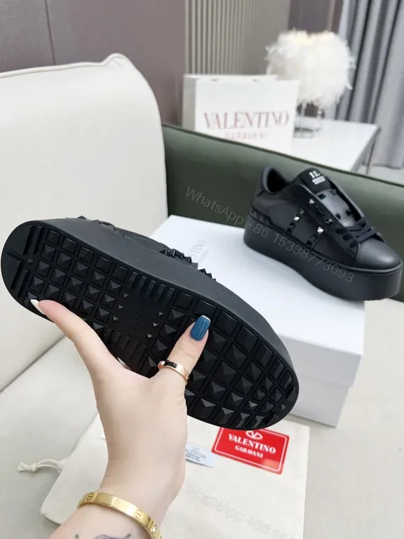 View 9 of Valentino Garavani Black Leather Studded Luxury Sneakers