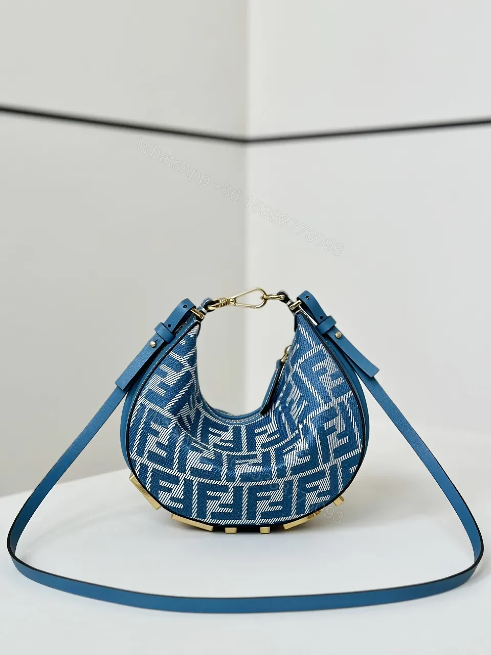 View 6 of Blue Monogram Hinge Bag in Signature Pattern - Everyday Luxury Bag