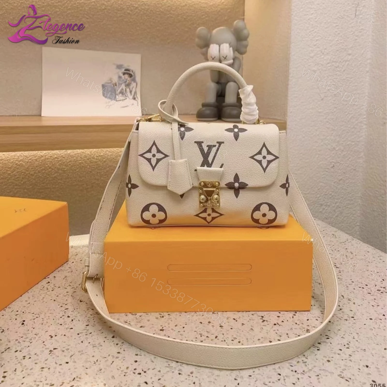 View 8 of FIRST COPY LOUIS VUITTON MADELEINE MM BICOLOR HANDBAG
